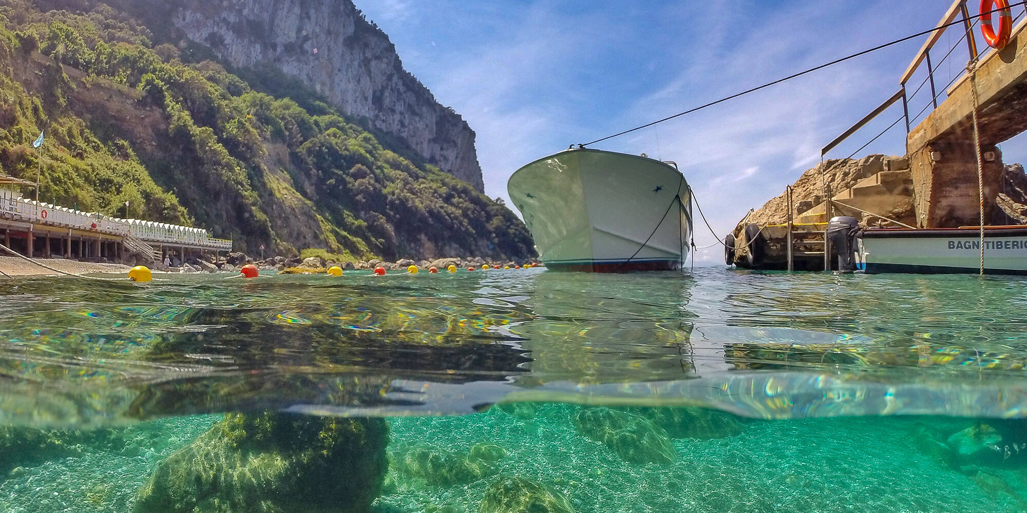 A beach club, restaurant, and boat<br>for the perfect day on Capri